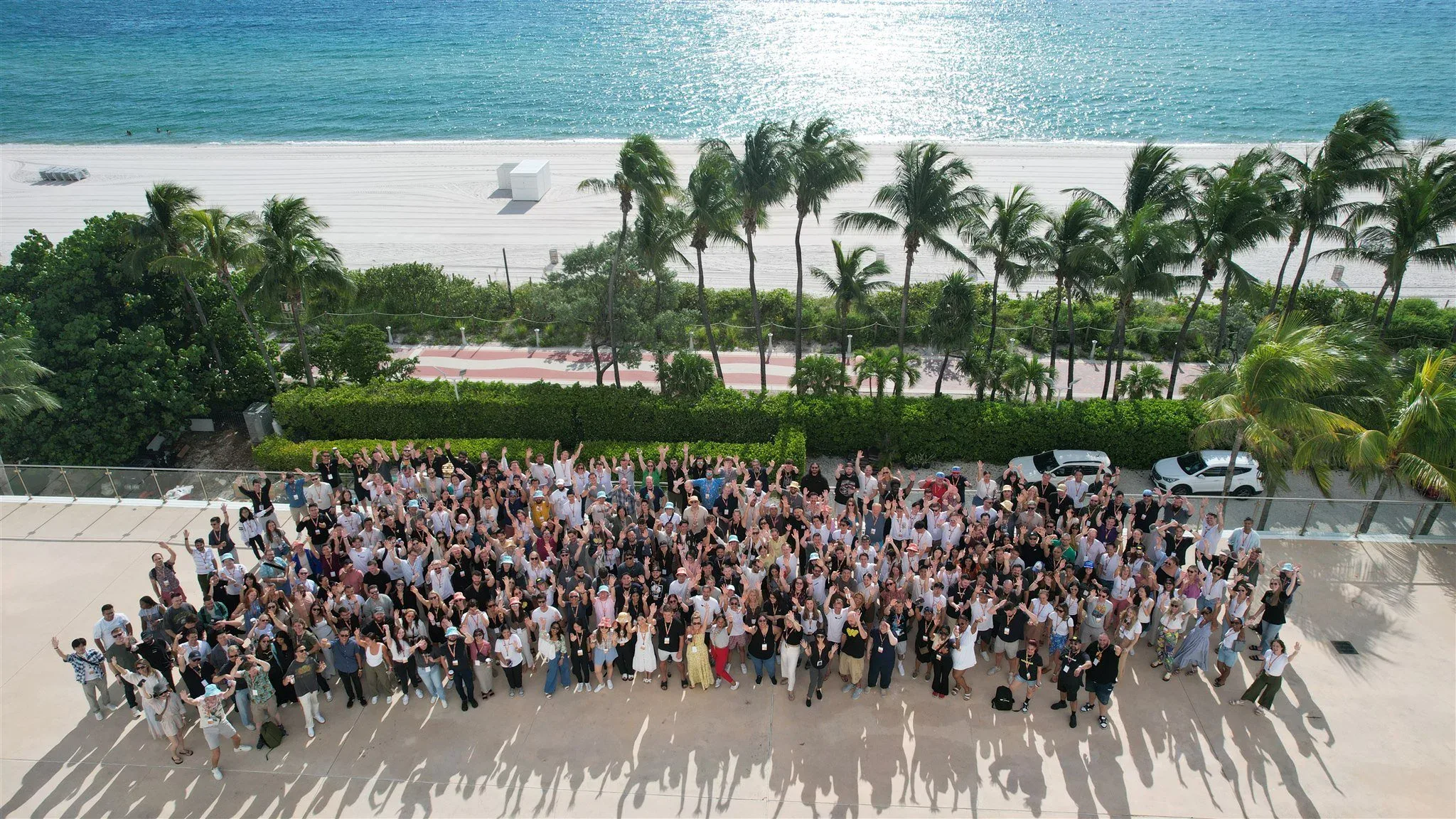 The Whatnot team gathered by the beach at a company offsite